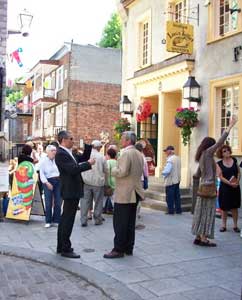 The ever-charming French are prone to gestures. Street scene in the Lower Town. Photo: Mary O’Brien