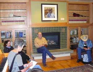 Executive Director Charlie Seeman talks to reporters at the Western Folklife Center