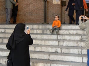 Proud parents take photos in Tehran.