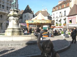 Dijon, France: Full of Kid-Friendly Surprises 3 At the fountain that kids love at the Place Francois Rude.