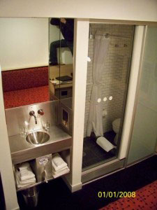 The "bathroom" and shower in the "double." Notice the mirror; the room is small enough that I had to climb on the desk and do some contortions in order to get a wide enough perspective.