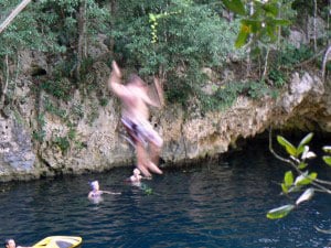 Ecotourism in Cancun: Wilder Than We Expected! 8 Jumping into the blue water of the cenote, at Selvatica, in Mexico