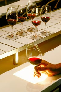 Sampling the wine, checking for the subtle differences.