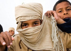 Traveling Tunisia: Exotic Souks, Ancient Ruins and Fabulous Food 14 A young man at the Douz Festival