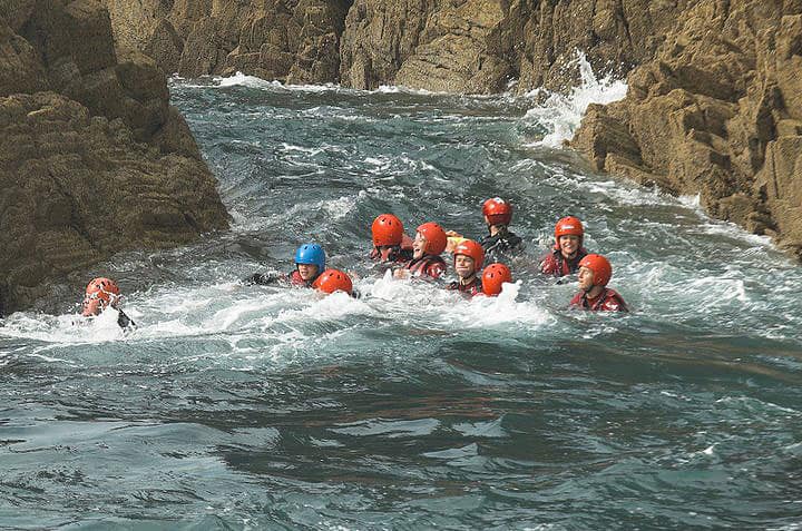 After climbing then leaping from cliffs as high 25 feet, you ride tidal currents and whirlpools. 'And you pay for this?' My wife asked. Photo courtesy of TYF Adventures. Coasteering.