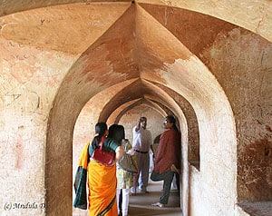 Listening to the guide, inside the Labyrinth, Bara Imambara, Lucknow - photos by Mridula Dwivedi
