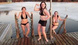 Preparing to take a dip in the hole in the ice.