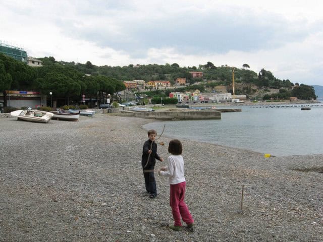 Portovenere, Italy: A Great Vacation with Kids 5 Kids enjoy playing on the beach in Portovenere, Italy, on the Ligurian coast. photos by Alexandra Regan.