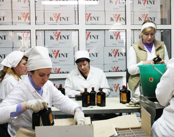 Checking and boxing bottles of Kvint