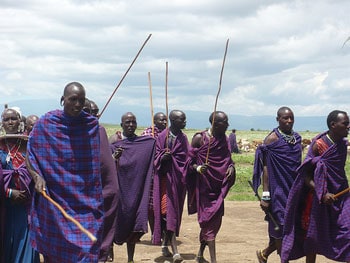 Masai men with their shuka and clubs 