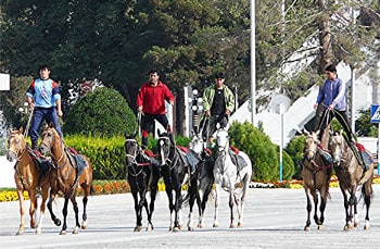Turkmenistan: Tinhorn Tyranny 11 Parade riders