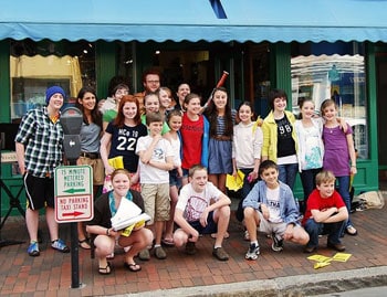 The kids from the Seacoast Repertory Theatre pose after an impromptu performance