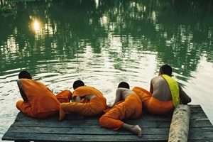 Monks by the river.