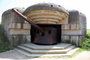 Normandy's D-Day Beaches and Interesting Museums 3 Rusty gun at the Longues-sur-mer emplacements. Photo by Paul Shoul.