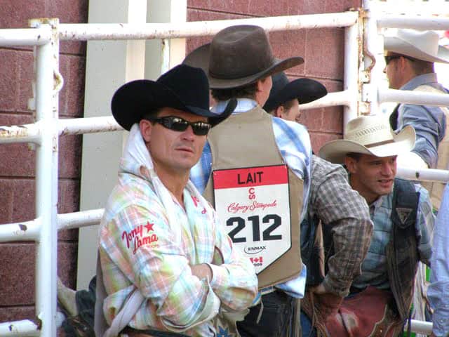 Cowboys wait for their turns for the next event at the Stampede