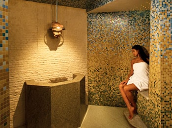 Inside the Herbal Laconium at the Canyon Ranch Spa, the air is heavy with a heral-infushed humidity