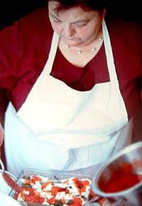 Mamma Agata makes bruschetta.