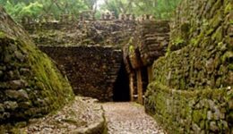 The path leads straight to the narrow archway into the pyramids dark interior.
