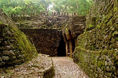 The path leads straight to the narrow archway into the pyramids dark interior.