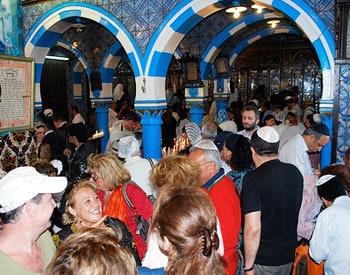 Controlled chaos at the El Ghriba Synagogue on the island of Djerba in Tunisia during the El Ghriba festival. Photos by Sonja Stark.