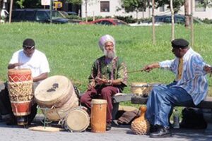Men drumming in a park in the South Bronx.