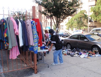Selling clothes on the sidewalk in the Bronx.