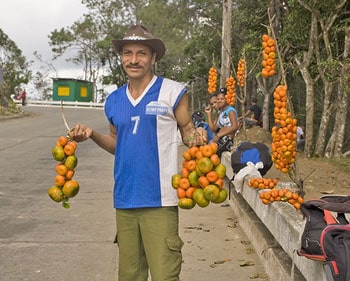 A roadside orange vendor in Cuba