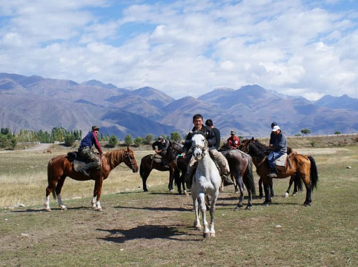 Dead Goat Polo, National Sport of Kyrgyzstan 2 Riders gather before the start of the dead goat polo match.