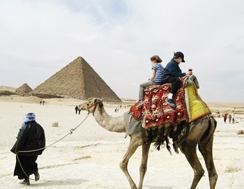Riding a camel around the Pyramids and the Sphinx. Photo by Alexandra Regan