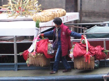 The Macau Grand Prix: Fearsome Motorsports Competition 2 Unloading flowers from a cargo boat