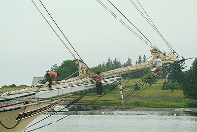 Crewmembers on the bow of the Nathaniel Bowditch.