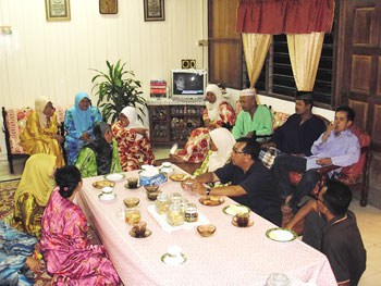 Village families open their homes for Hari Raya Aidilfitri.