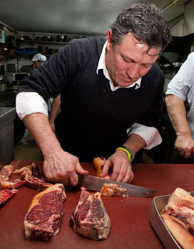 Santiago de Compostela, The Wild Tapas, Page 2 4 Flavio Morganti chips in to prepare grass-fed beef for the grill at O Dezaseis.