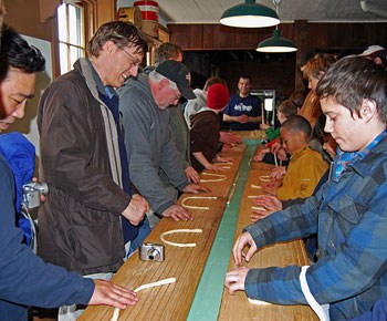 Pretzel-making in full swing inside the Julius Sturgis Pretzel Bakery