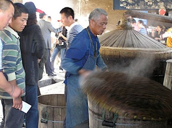 The Water Town of Wuzhen: The Venice of China 5 At the Sanbai Wine Workshop, baiju rice wine is made the way it has been for hundreds of years.