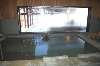 Onsen and Sakura: Experiencing Japan's Cultural Icons 2 Inside the onsen, or Japanese bath, with snow outside.
