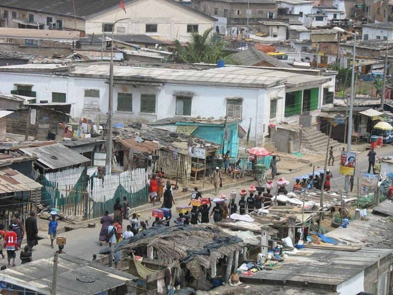 Bringing wares to market in Cape Coast, Ghana