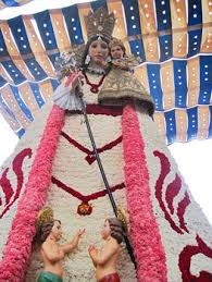 Valencia, Spain: Las Fallas, One Crazy Festival! 9 Bouquets complete, the beautifully completed Blessed Virgin Mary stands on display in The Virgin Square in Valencia, Spain.