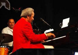 Alan Toussaint on stage at the New Orleans Jazz Fest
