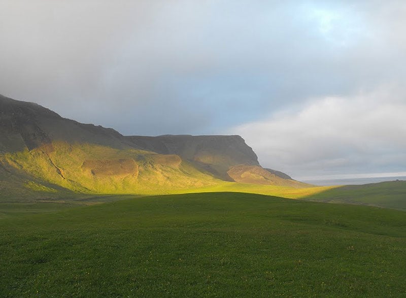 Sun on the cliffs near Vik, Iceland