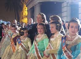 Valencia, Spain: Las Fallas, One Crazy Festival! 4 Emotions take over this group of young ladies as they watch the Ninots burn to the ground. They are alternating between crying and laughter, not sure what to do. The Mayor of Valencia stands behind them in the dark jacket.