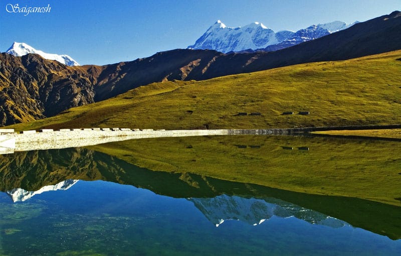 Roopkund, India: A Week-Long Trek to Skeleton Lake 7 Nandaghunti and Trishul reflected over the placid waters of the sacred Bedni kund in Uttarakhand, India