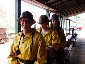 Don, Mike and Sara Bruschi take the miners' train down 1,500 feet into the Queen Mine.