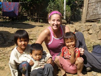 Lost Girls member Amanda Pressner with Laotian children in Luang Prabang 