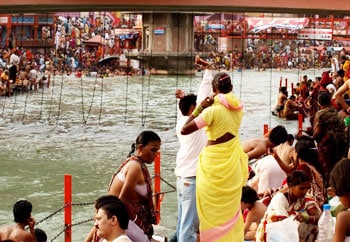 Bathing in the river at the huge gathering.
