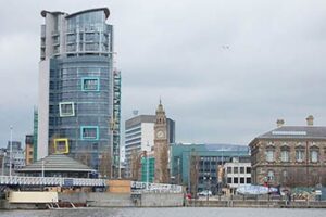 Belfast, Northern Ireland: From Blast to Bloom New and old buildings, including the Albert Clock, on the Belfast waterfront