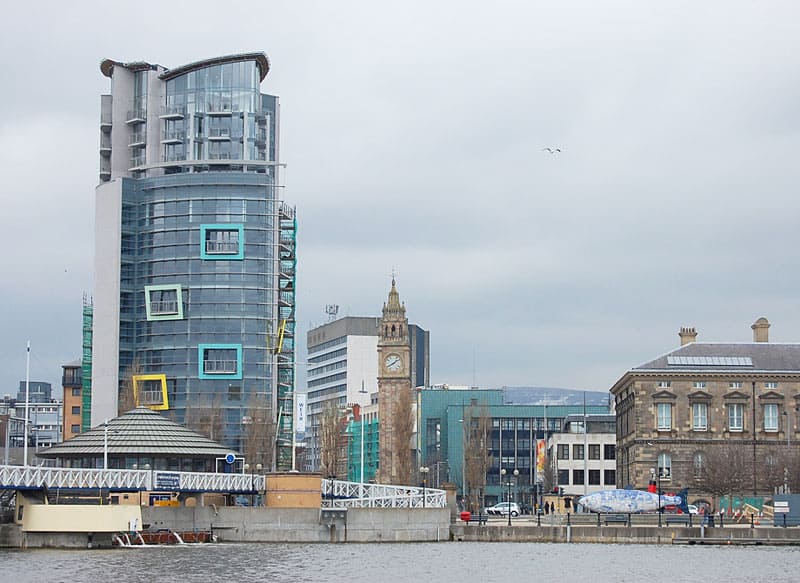 Belfast, Northern Ireland: From Blast to Bloom 1 New and old buildings, including the Albert Clock, on the Belfast waterfront