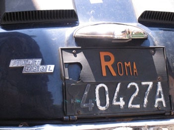 Classic license plate on a classic Italian car