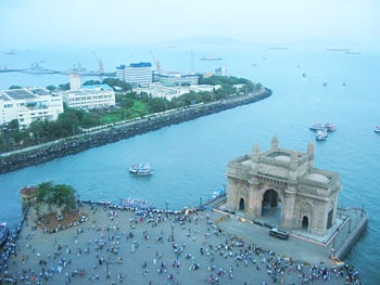 The Gateway of India provides a solid historical marker, built in 1911 as a symbol of the British Empire to those arriving by boat.