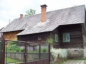 Wallachian Rocks on the Czech-Slovak Border 5 Traditional Wallachian house with puzzle-like wood stack